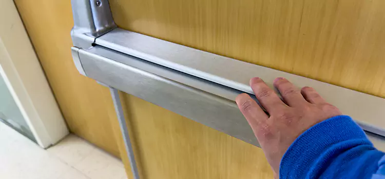 Installing a Push Bar on a Door Colonia